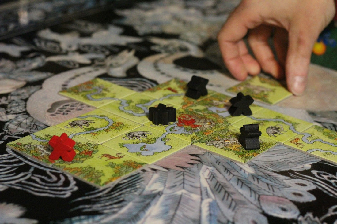 What Is a Tile-Laying Game?