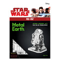 Star Wars Metal Earth R2-D2 steel model kit packaging, featuring a black background with red and green text, a silver 3D-rendered R2-D2 model, and Disney branding at the top.
