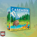Board game box for 'Cascadia Junior' with nature-themed illustration on a forest background