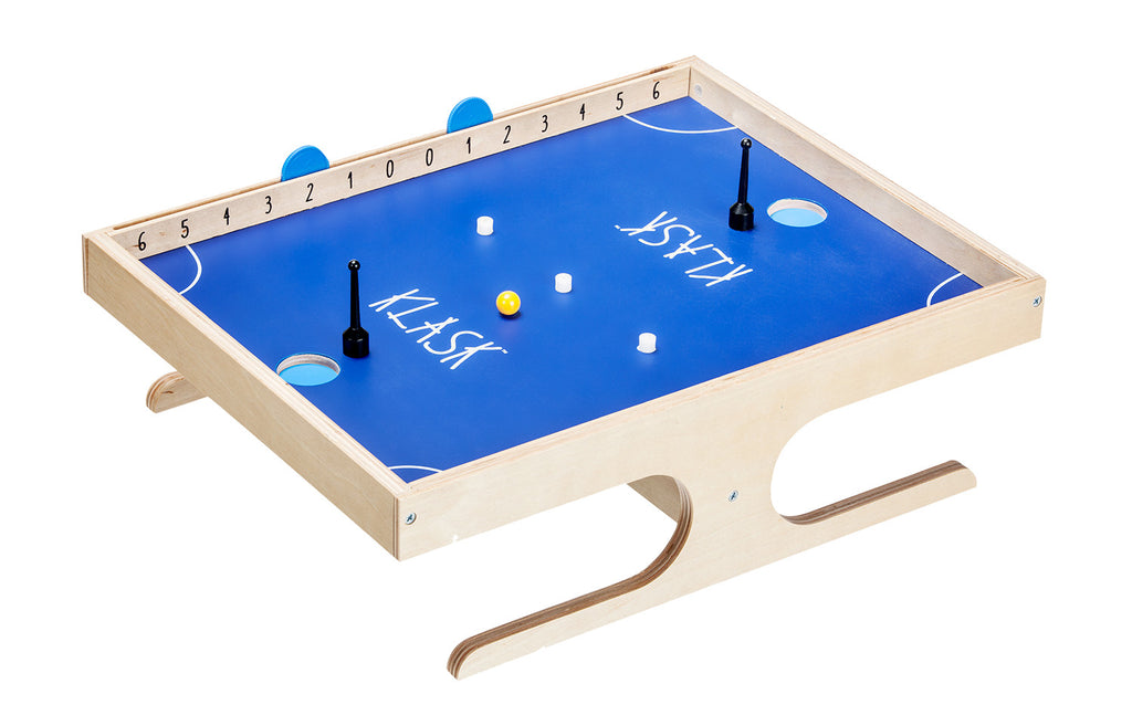 Small table with a blue playing surface and wooden frame, featuring the brand 'Klask'.