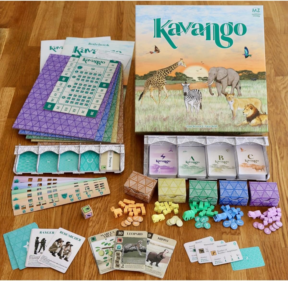 Kavango board game components on a wooden surface