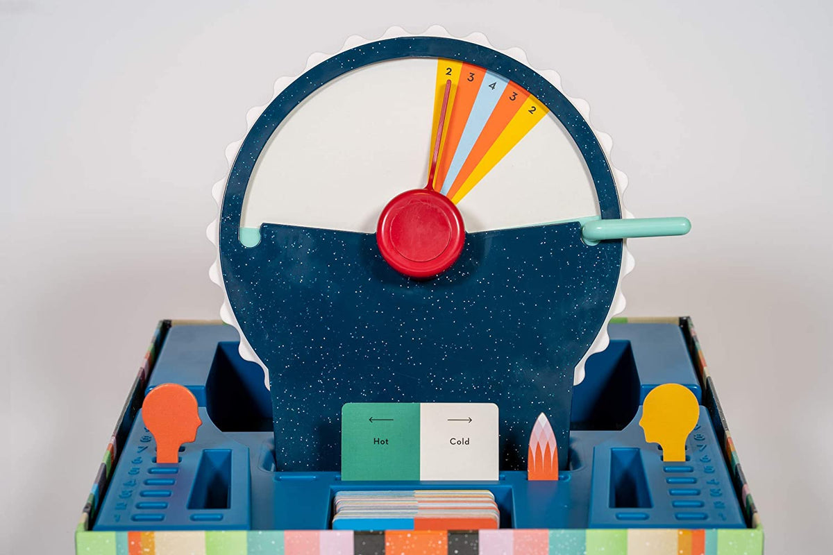 Colorful educational toy with a wheel and various compartments on a white background