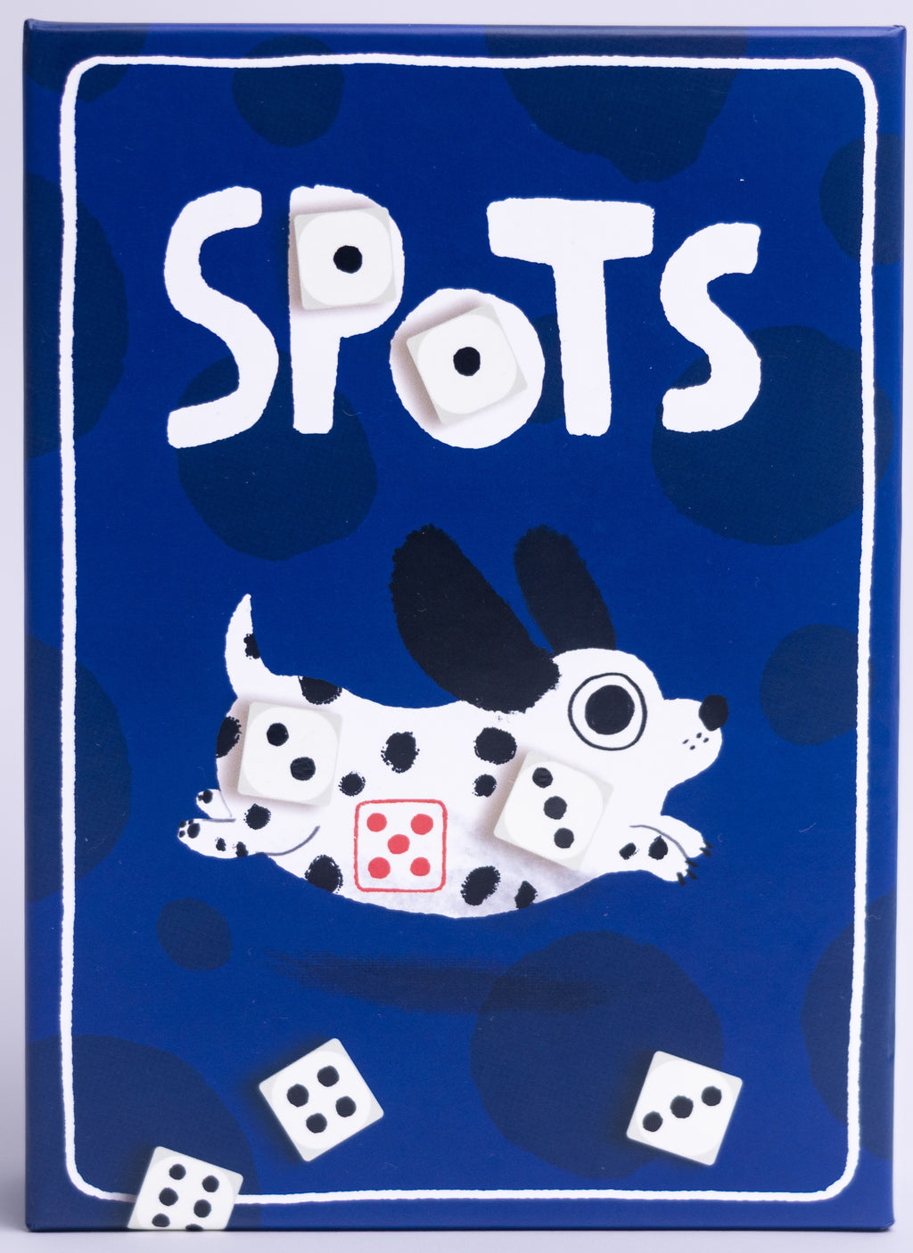 Card game box titled 'Spots' with a dalmatian dog illustration on a blue background.