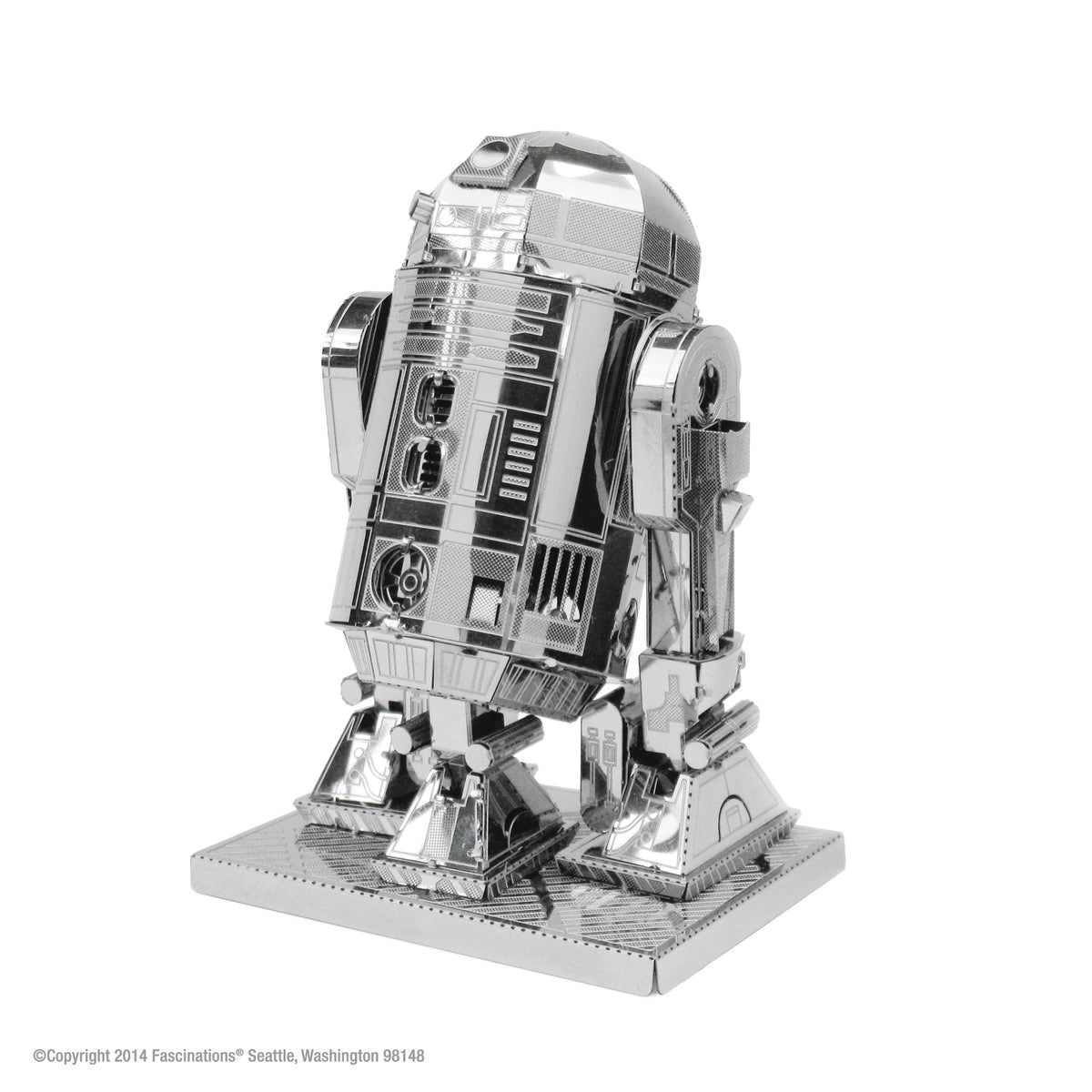 Metal model of R2-D2 from Star Wars on a white background
