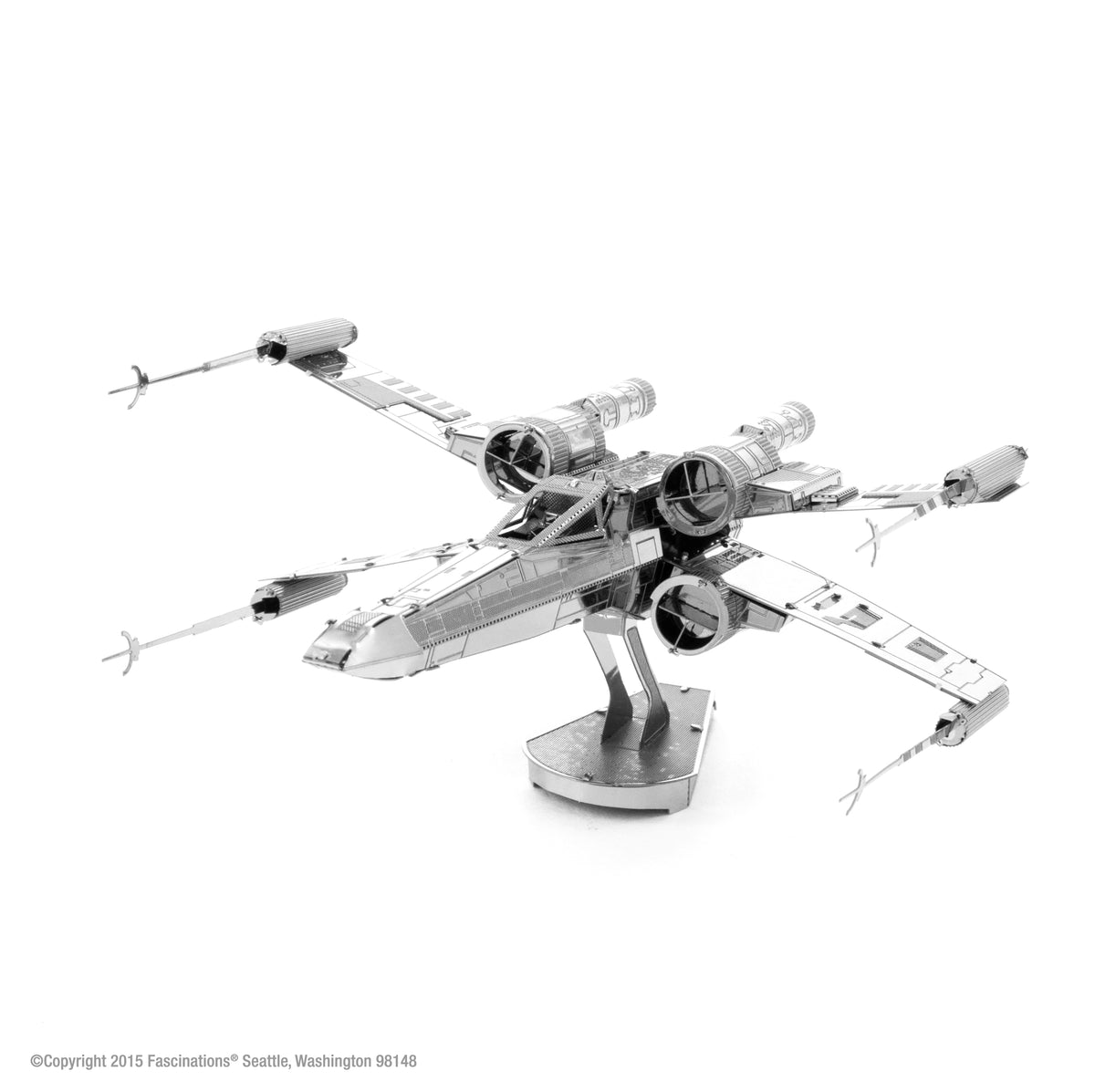 Metal model of a spacecraft on a white background