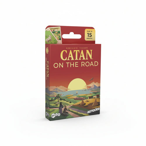 Catan on the Road board game box with sunset landscape illustration